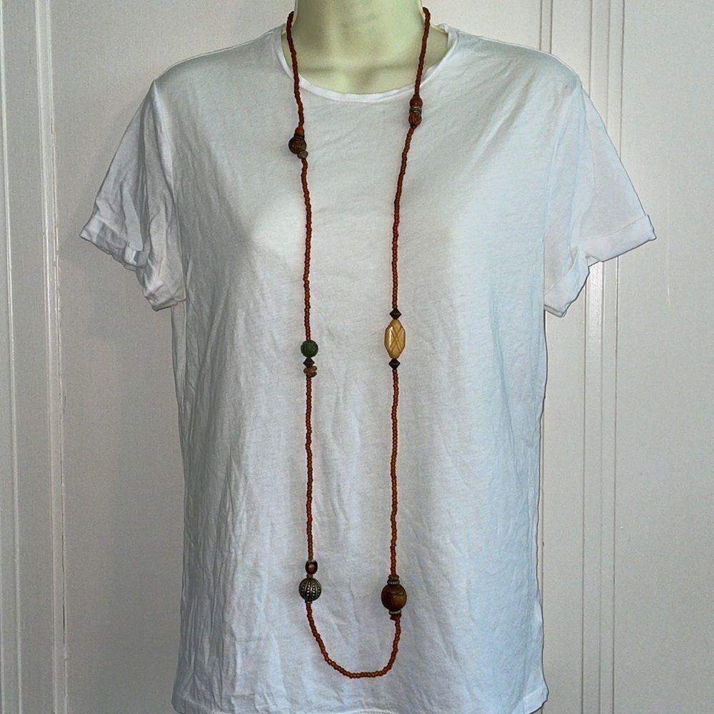 Robert Rose long small amber stone necklace with larger stone accents